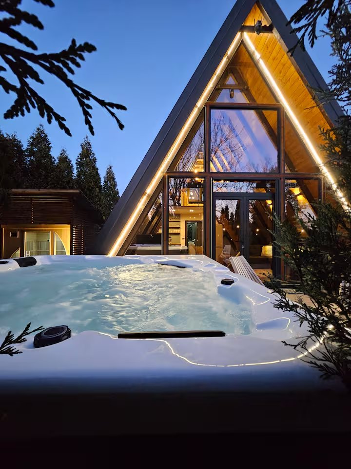 A-frame cabin exterior on a beautiful sunny day