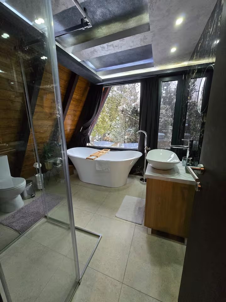 Interior at night with illuminated panoramic windows