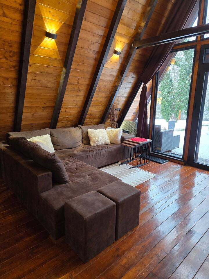 Living area with TV setup and comfortable seating